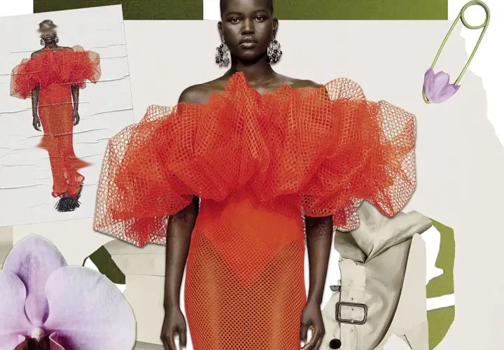 Un desfile de moda con un vestido naranja voluminoso, orquídeas y un imperdible con flor. El derecho de la moda inspira estas creaciones.