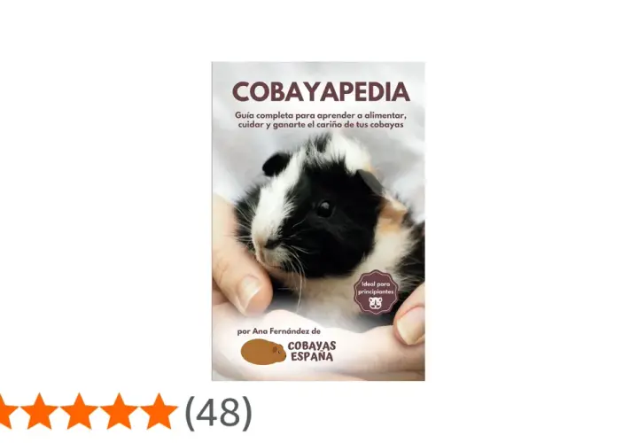 Libro "Cobayapedia" con una cobaya en manos, ideal para aprender qué es una cobaya y cómo cuidarla.
