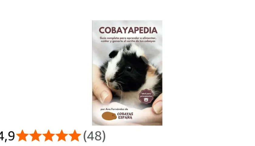 Libro "Cobayapedia" con una cobaya en manos, ideal para aprender qué es una cobaya y cómo cuidarla.